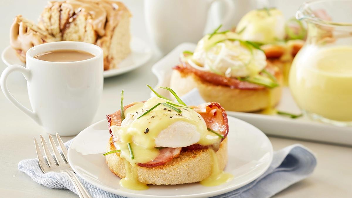 Article Cards Featured Image Eggs Benedicts on Wolferman's English muffins displayed on white plates for an important morning breakfast