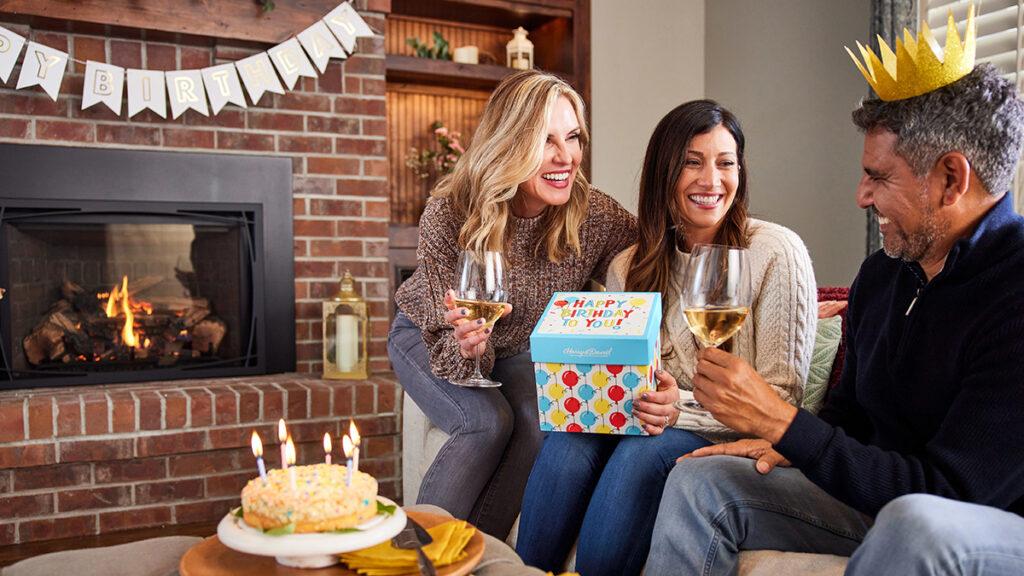 Group of adults celebrating a December birthday