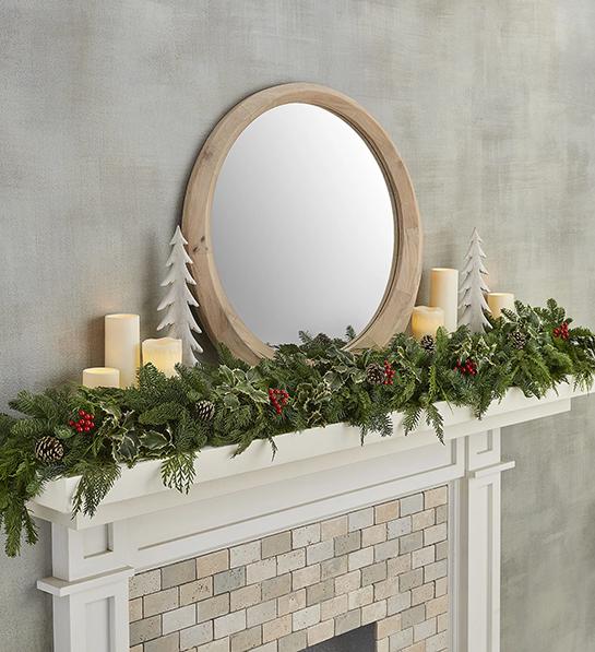 Christmas decoration garland on a mantel piece.