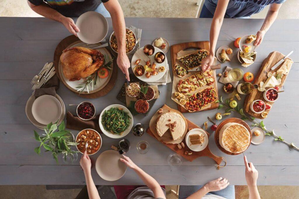 tryptophan overhead shot of a full Thanksgiving meal.